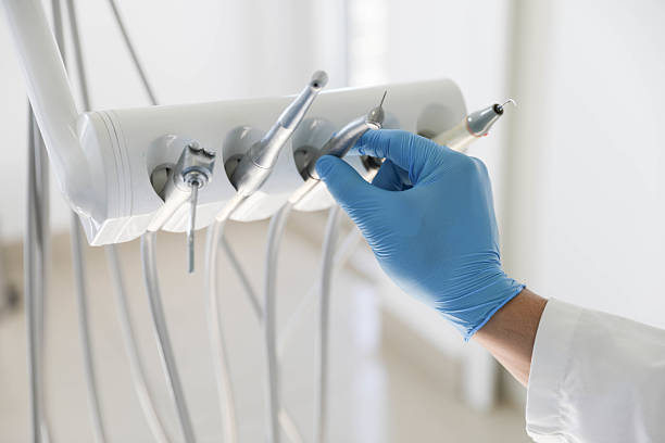 Professional Tooth Extraction technician working in Mulberry, NC